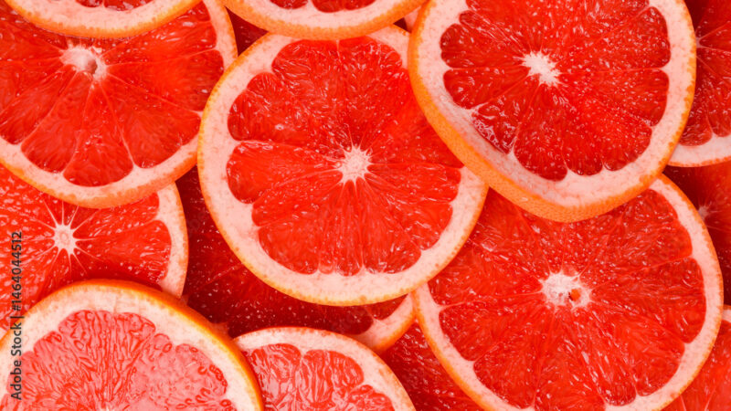 Grapefruit pattern. Top view citrus fruits. Close up.