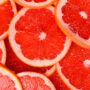 Grapefruit pattern. Top view citrus fruits. Close up.